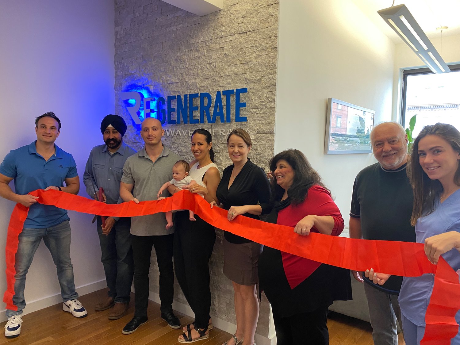 Regenerate SoftWave Therapy hosted a festive Open House in Hoboken on Tuesday, June 22. On hand to celebrate were, from left to right: Co-founder Dr. Marco Ferrucci, Hoboken Mayor Ravi S. Bhalla, Co-Founder Dr. Tim Lyons, Lorenzo Lyons, Lisa Lyons, Hoboken Council Member Tiffanie Fisher, Doreen Dalli, Joe Montelone, and Erin Robinson.